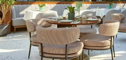 Contract outdoor and restaurant furniture collection in a hospitality venue